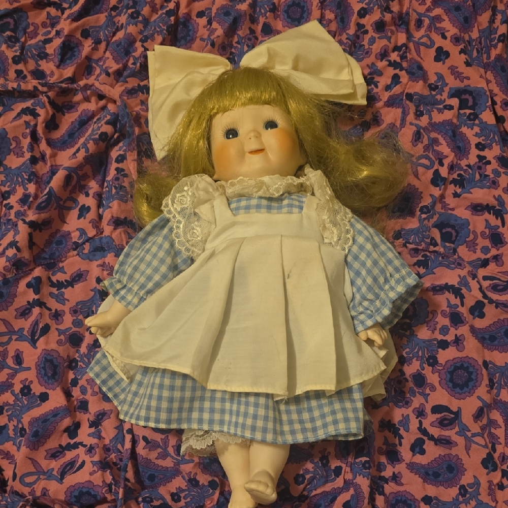 Charming Blue and White Doll with Bow